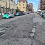 Buche e strada dissestata in via Forlì