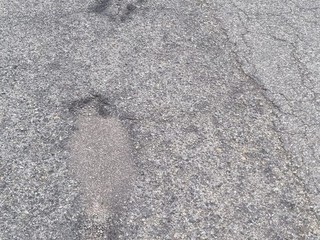 Buche e strada dissestata in via Forlì
