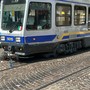 Bici sotto un tram in piazza Castello, deviata la linea 15