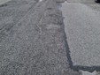 Buche e strada dissestata in via Forlì
