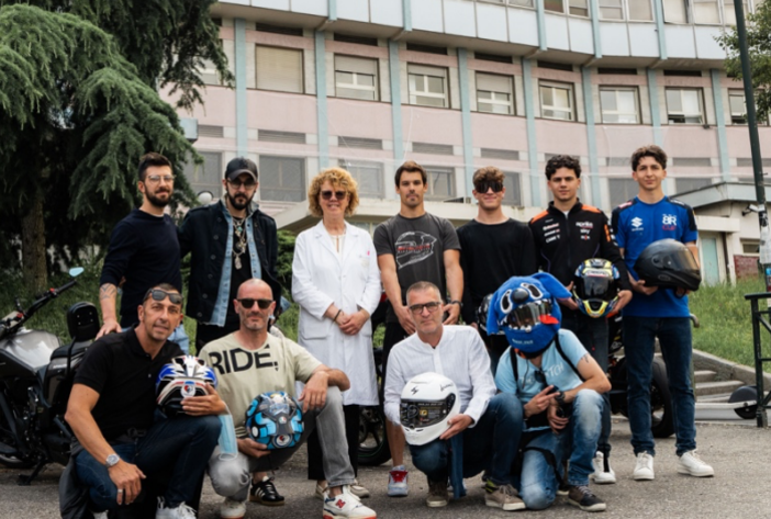 Visita dei piloti di motociclismo al Regina Margherita di Torino