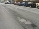 strade piene di buche