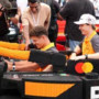 Formula 1, piloti in pista con macchine di... Lego. E pezzi di McLaren volano via - Video